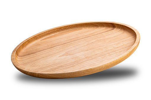 High angle view closeup of empty new wooden plate isolated on white background with clipping path.