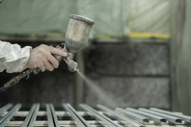 istock Spray painting frames in a shop 2148281813