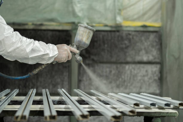 istock Spray painting frames in a shop 2148281815