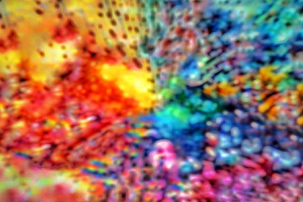 Abstract blurred spotted texture background multicolor red yellow blue green with copy space for design elements
