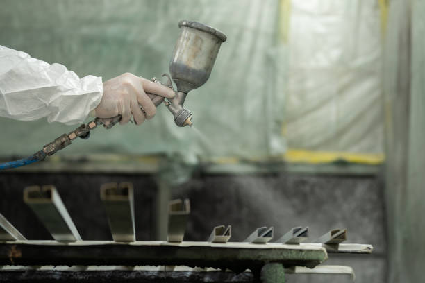 istock Spray painting frames in a shop 2148281932