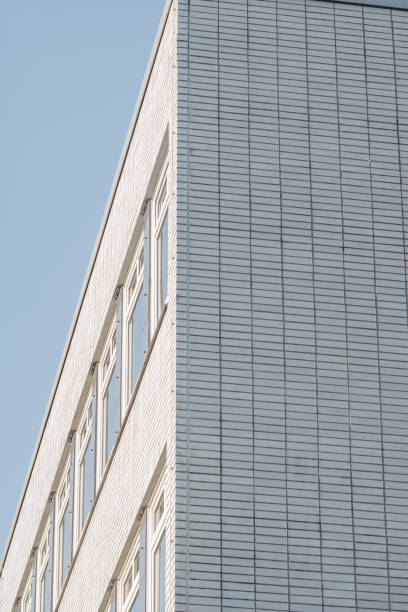 istock facade of an modern large house ,wall with windows 2148282662