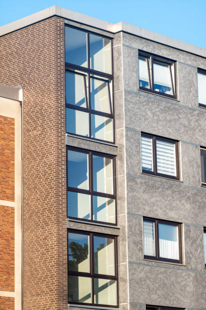 istock facade of an modern large house ,wall with windows 2148282742