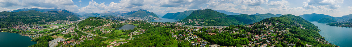 Panoramic view of Lugano, lake and mountains