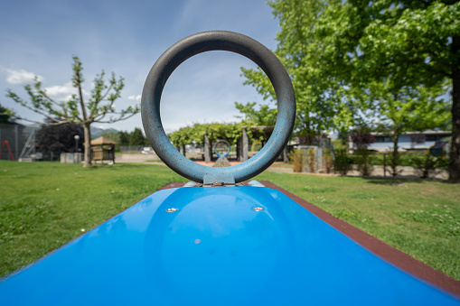 View through metal ring on sports field