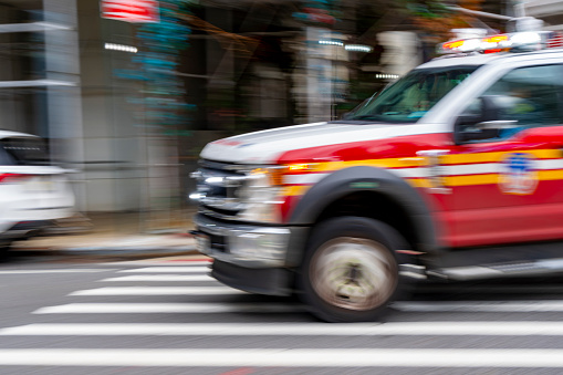 Christopher Street, Greenwich Village, Lower Manhattan, New York, USA - March, 2024.  New York Fire Department Ambulance on Christopher Street in Greenwich Village