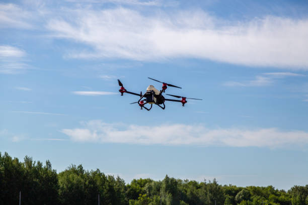 istock Agriculture drone fly to sprayed fertilizer on the fields. Industrial agriculture and smart farming 2148285634