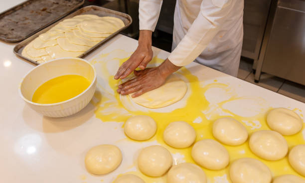 istock A cook prepares bread from dough in a restaurant 2148286453