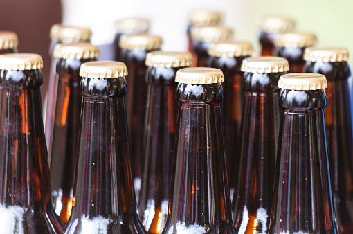 Brown glass bottles with caps.