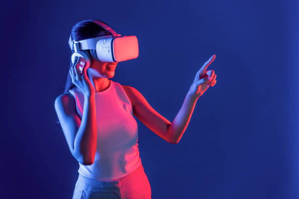 istock Elegant female connect metaverse use finger point virtual object. Hallucination. 2148288757