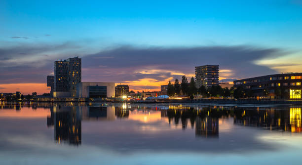 istock the sunset city skyline with reflection in the lake in Almere centre 2148290683