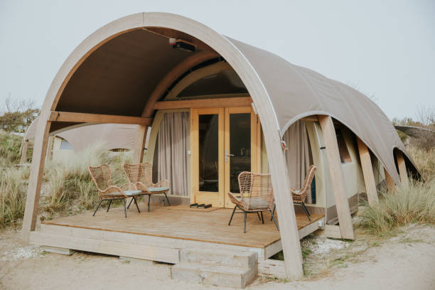 glamping tent in a grassland,dune, luxury camping lifestyle