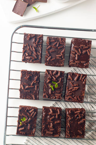 istock Delicious chocolate brownies with mint on white background. Sweet cake concept. 2148291187