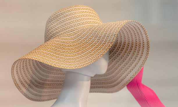 istock Women's hat on a mannequin in a shop window 2148292042