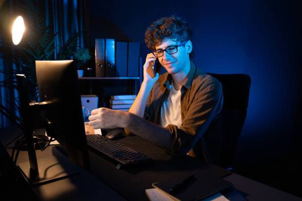 istock Young businessman calling on phone to customer or coworker. Gusher. 2148292141