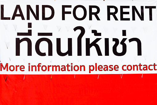 Land for rent real estate sign in english and thai