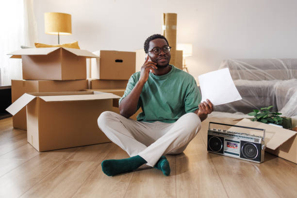 Young man moving into a new home