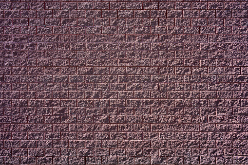 Background from a dark red brick wall