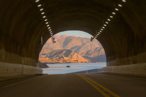istock Tunnel exit overlooking Lake Potrerillos at dawn, in Mendoza, Argentina. 2148294322