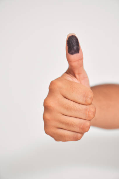 istock Close up Election day, ink stained finger after voting 2148299336