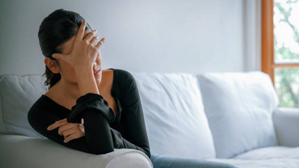 istock Depressed young Asian woman with mental health problem need uttermost treatment 2148299470