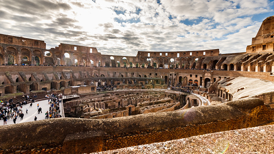 Rome, Italy - December 27, 2023: interior view of the Coliseum of Rome visited by tourists in the historic city center on a winter day