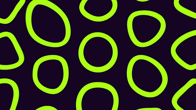 Black and yellow pattern of overlapping circles and ovals on dark background