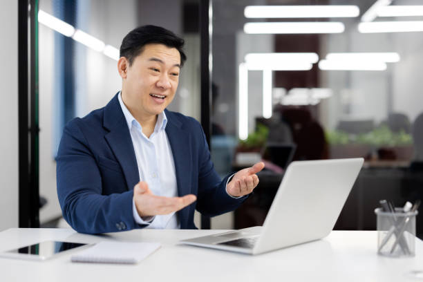 istock Businessman having a discussion during a video call 2148300287