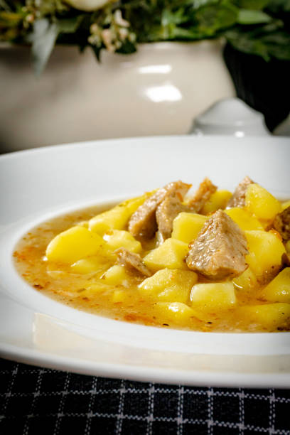 istock Borscht with potato and white sausage. 2148301985