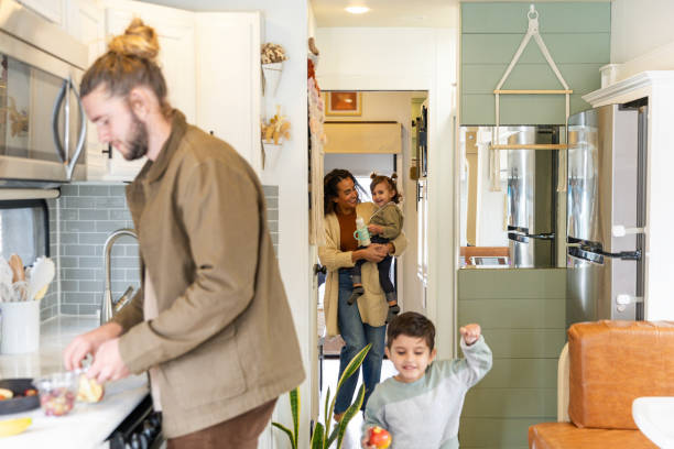 istock In RV, family ready to go as dad packs snack 2148302234