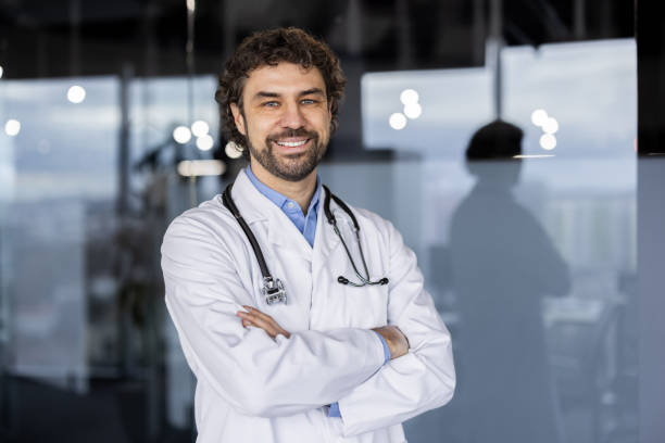 istock Friendly Hispanic doctor smiling in a hospital setting 2148302397