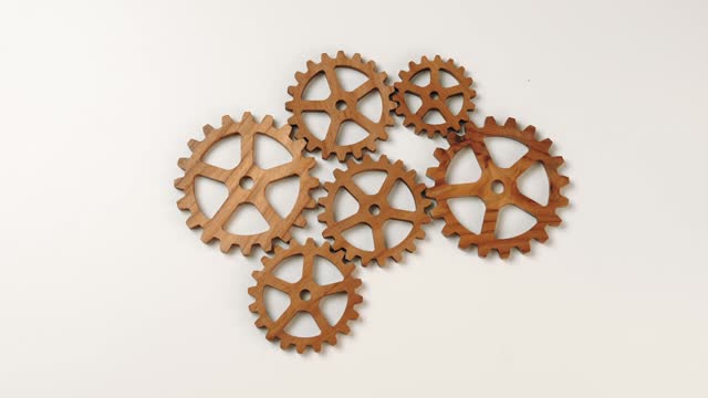 Employee connect wooden cogwheel gear symbol sharing the work synergy. Synergic