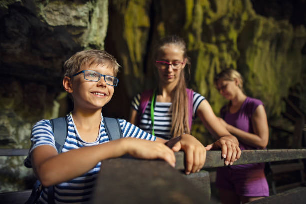 istock Family hiking and exploring a cave in Campania, Italy 2148303859