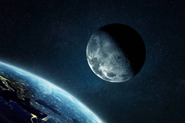 istock Beautiful moon with craters near the amazing blue planet earth in outer space. Space and orbit, concept 2148304665