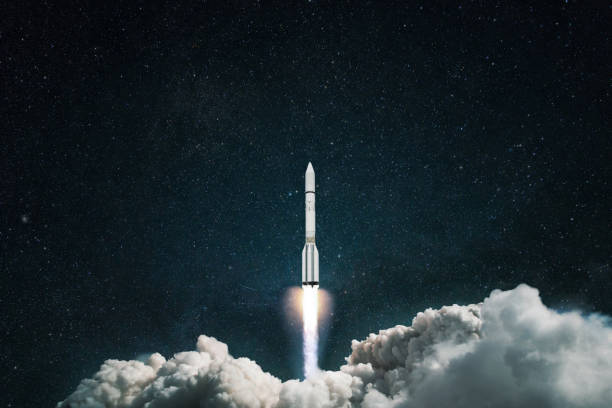 istock Spaceship launch into space. Rocket takes off in the starry blue sky 2148305171