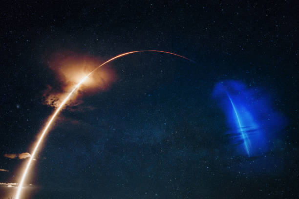 istock Modern rocket launches a satellite into orbit. Spaceship with blast flies on the starry sky 2148305194