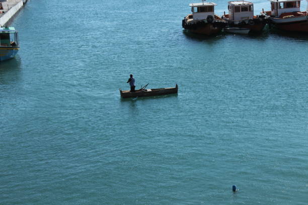 Typical Mediterranean Sea small artisanal fisheries. Trawlers at the harbor of Anzio