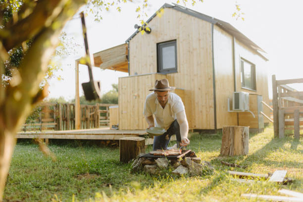 istock Young handsome man making barbecue at his backyard 2148307289