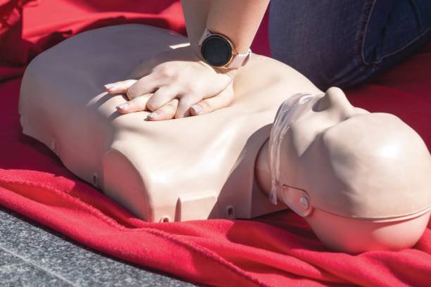 istock Paramedic performing CPR - Cardiopulmonary resuscitation and first aid 2148308892