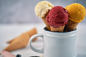 Berry, Mango and Vanilla Ice Cream in a Cone