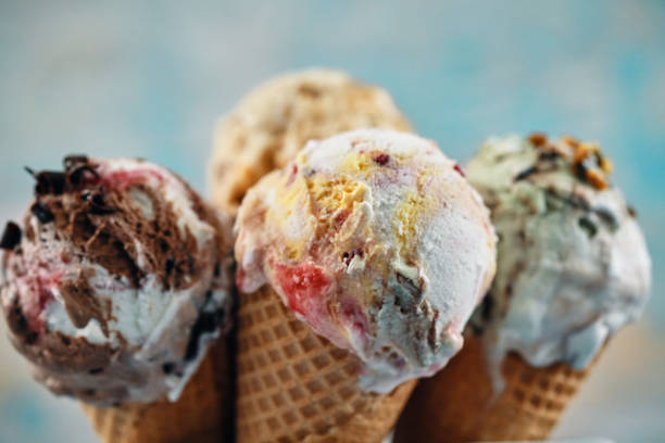istock Pistachio, Chocolate, Strawberry and Vanilla Ice Cream in a Cone 2148310290