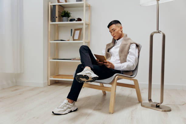 istock teenager sweater on shoulders tablet internet technologies 2148312833