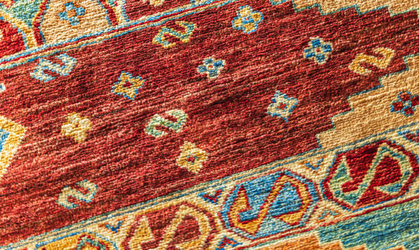 istock Colorful oriental silk carpet pattern, close up 2148314419