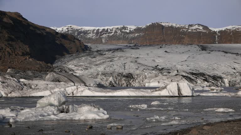 Melt water at the foot of the Solheimajokull Glacier. Southern Iceland. Early Spring. 2024