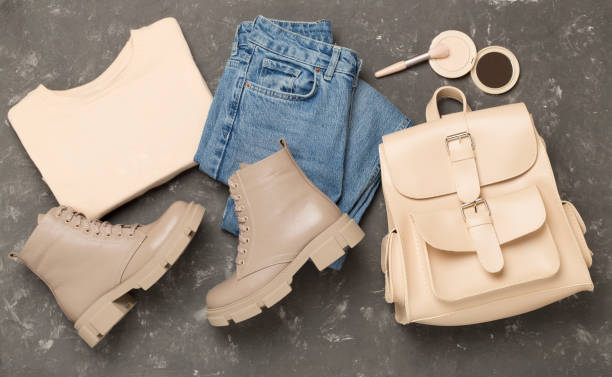 istock Flat lay with trendy spring outfit on concrete background, top view 2148320356