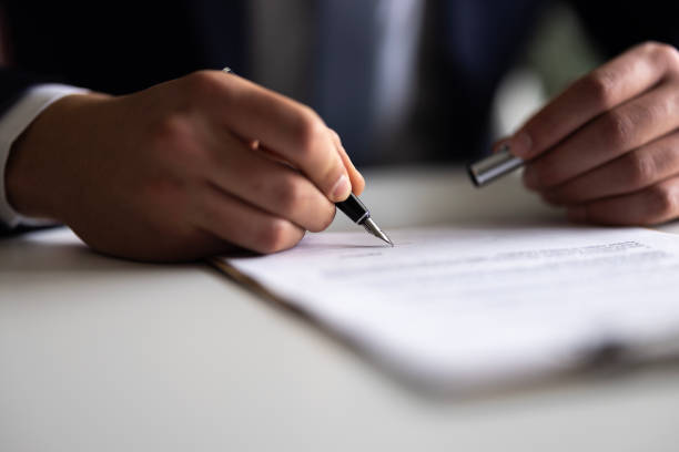 istock Businessman Signing Contract In The Office 2148320981