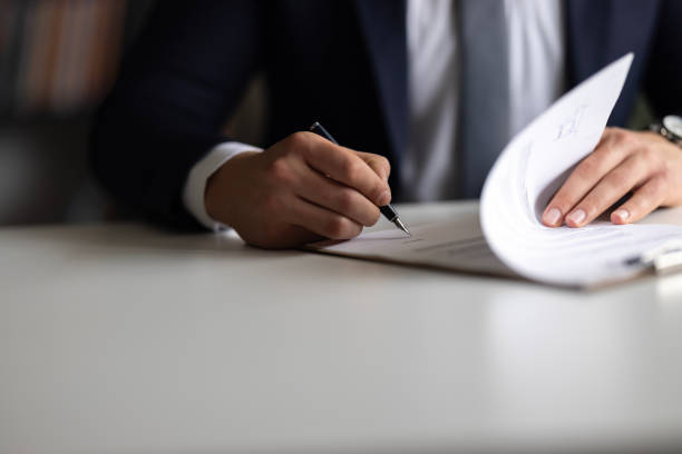 istock Businessman Signing Contract In The Office 2148320982