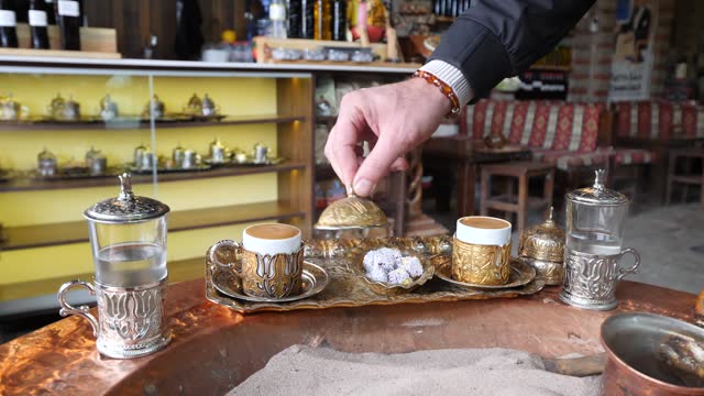 Preparing Turkish Coffee in the Sand