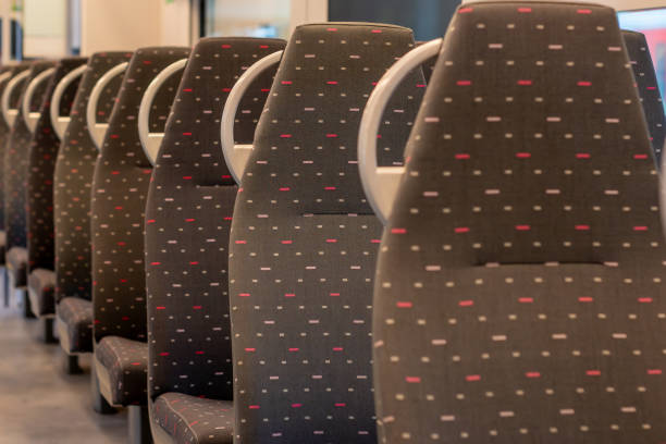 istock Empty Swiss Public Train Seats,train wagon with many seats,Empty comfortable and colorful chairs in a modern train. 2148321699