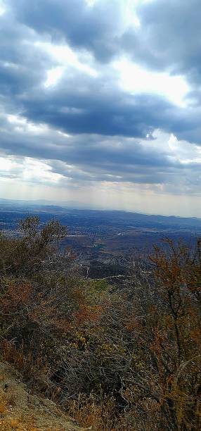 istock Rain over the city below as I stand on a mountain top 2148324689